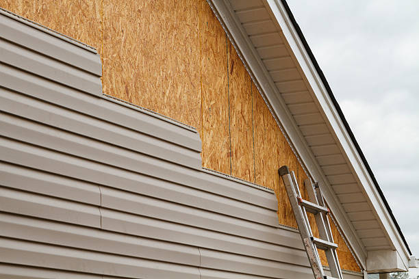 Professional Siding Installation technician working in Rome, NY
